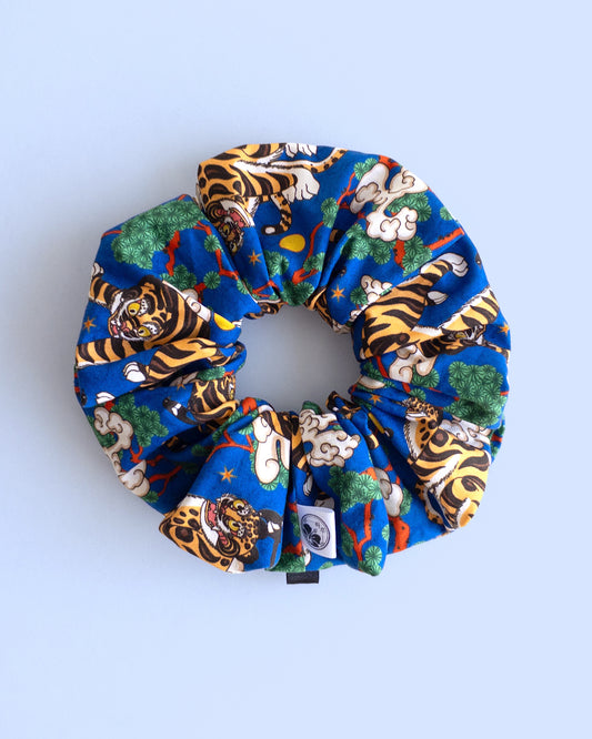 Hojakdo Korean scrunchie with tiger and magpie design on blue cotton fabric